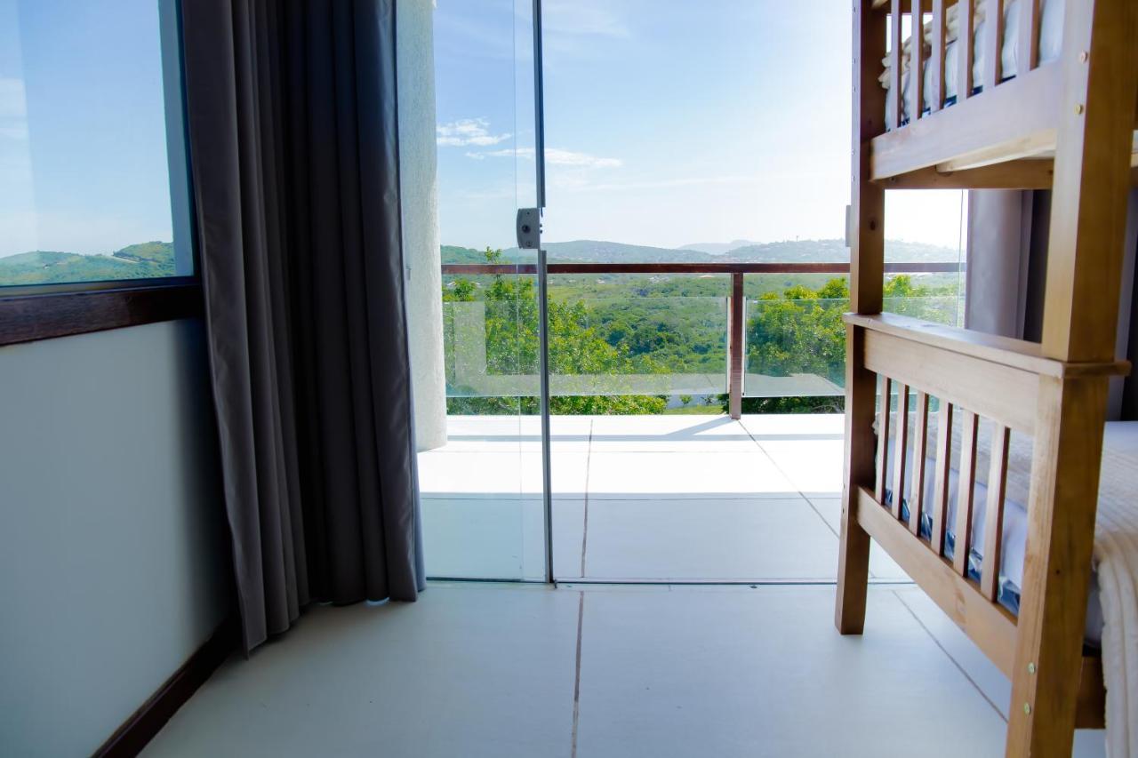 Quarto Quádruplo com Vista do Mar.