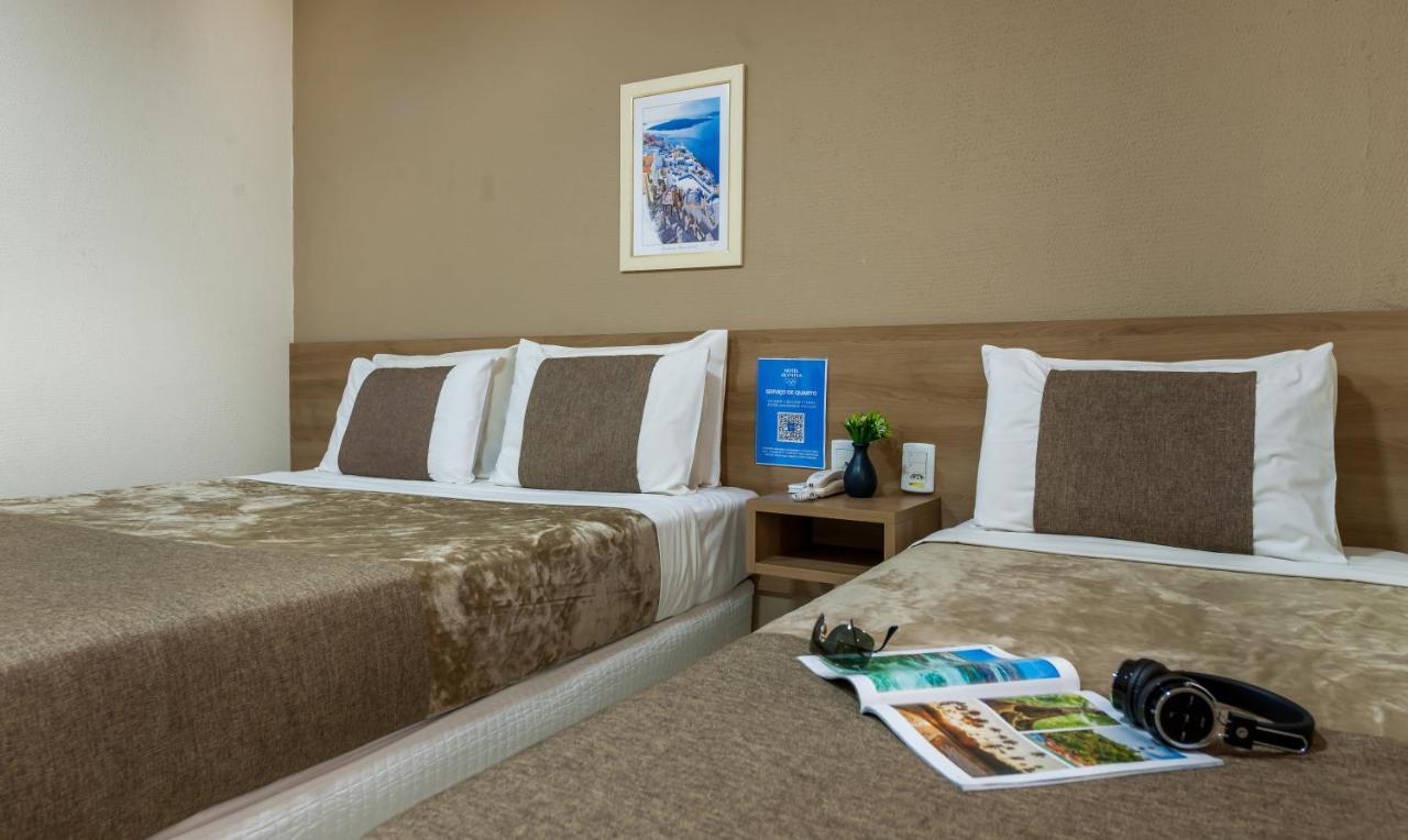 Quarto Triplo Deluxe (1 Cama de Casal + 1 de Solteiro)