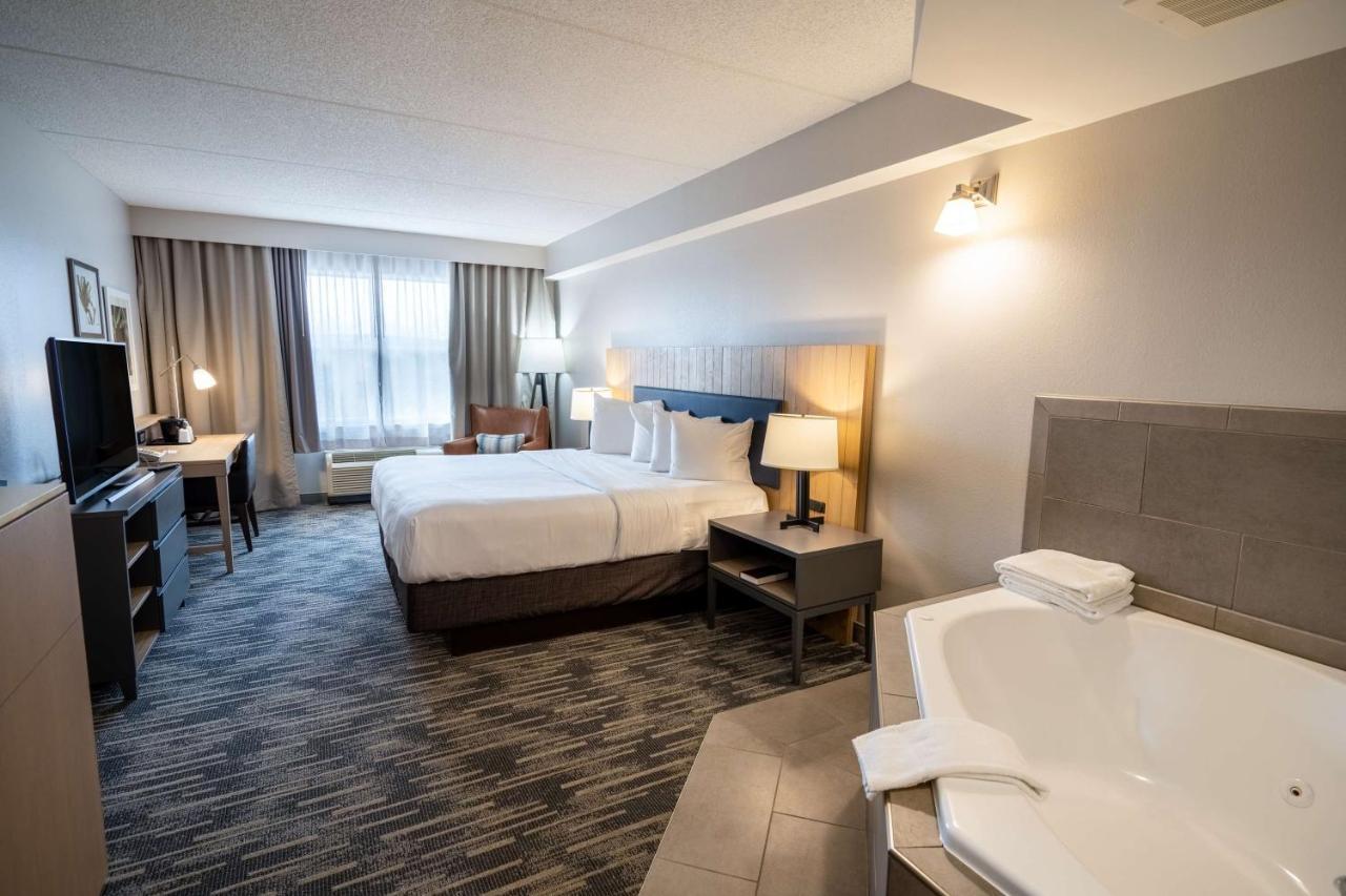 King Suite with Whirlpool and Roll-in Shower