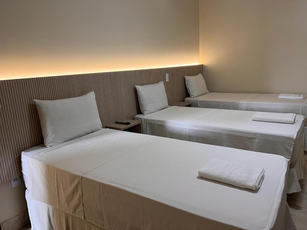 Quarto Triplo com Banheiro