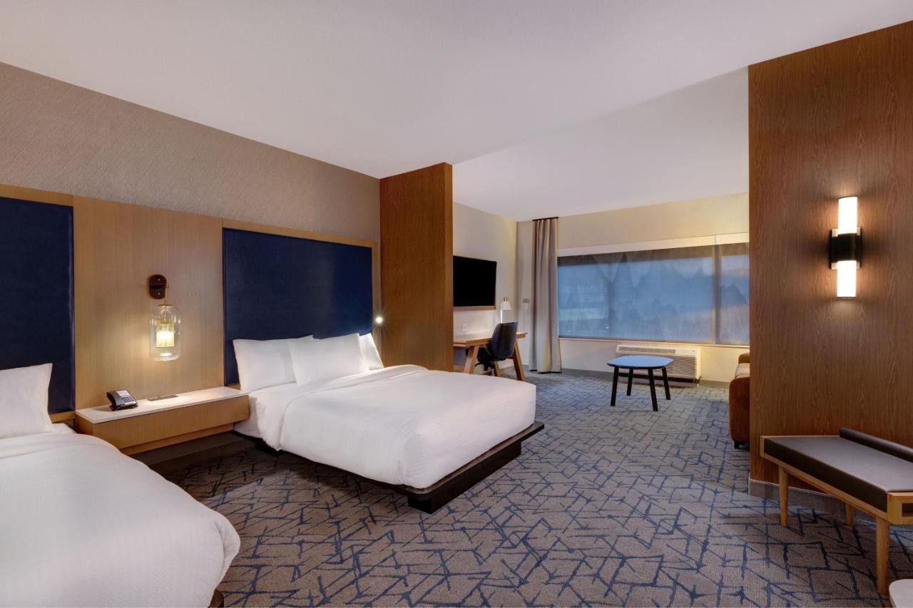 Queen Suite with Two Queen Beds and Sofa Bed