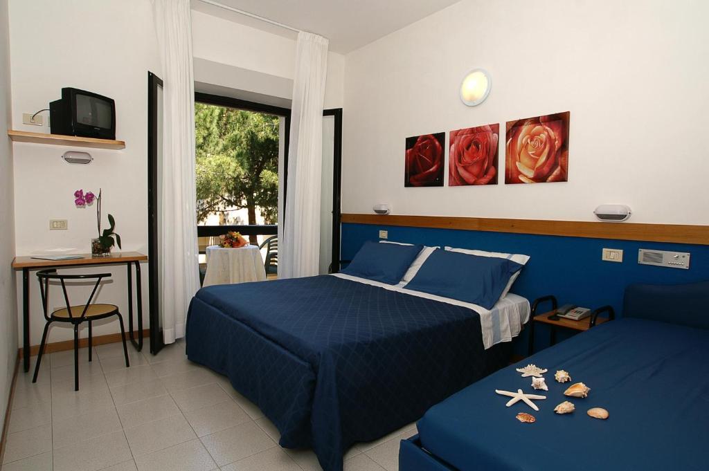 Camera Familiare con Balcone (2 Adulti + 2 Bambini)
