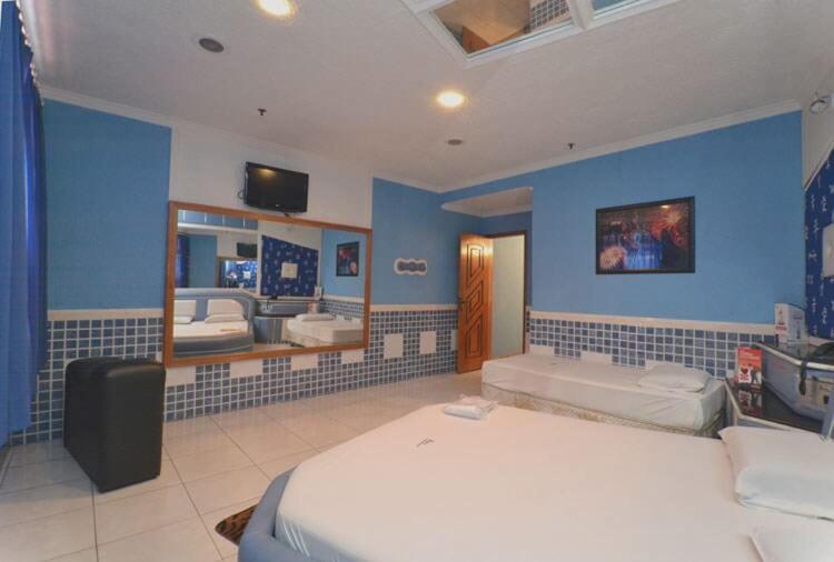 Quarto Deluxe com Cama de Casal ou 2 de Solteiro