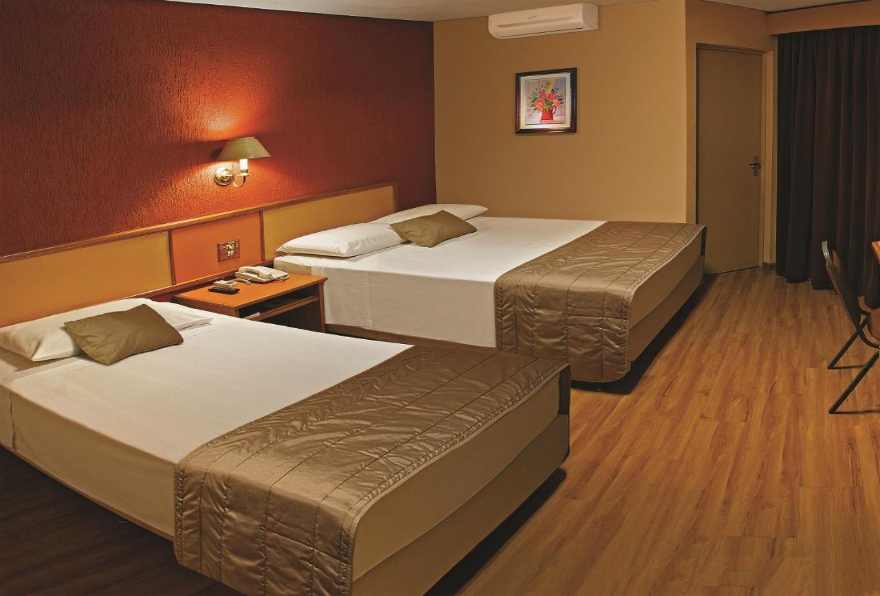 Quarto Triplo Superior com 1 Cama de Casal