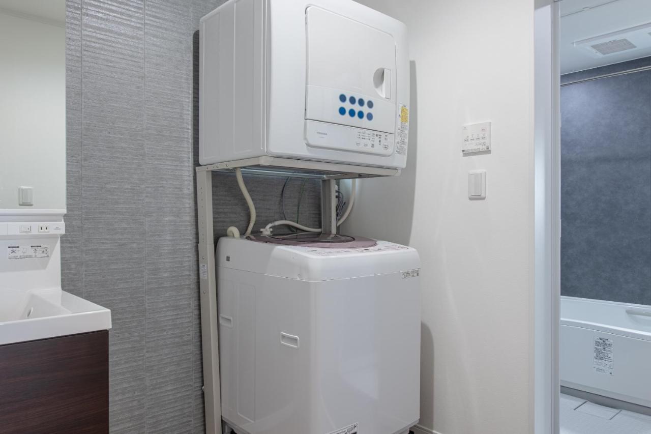 Chambre Lits Jumeaux avec Salle de Bains Commune