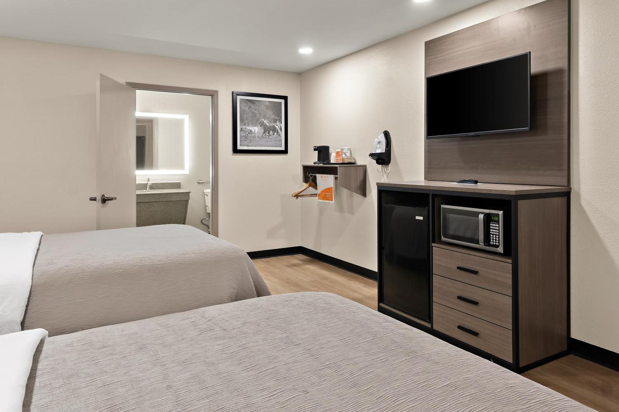 Queen Suite with Two Queen Beds and Sofa - Non Smoking/Interior Corridor