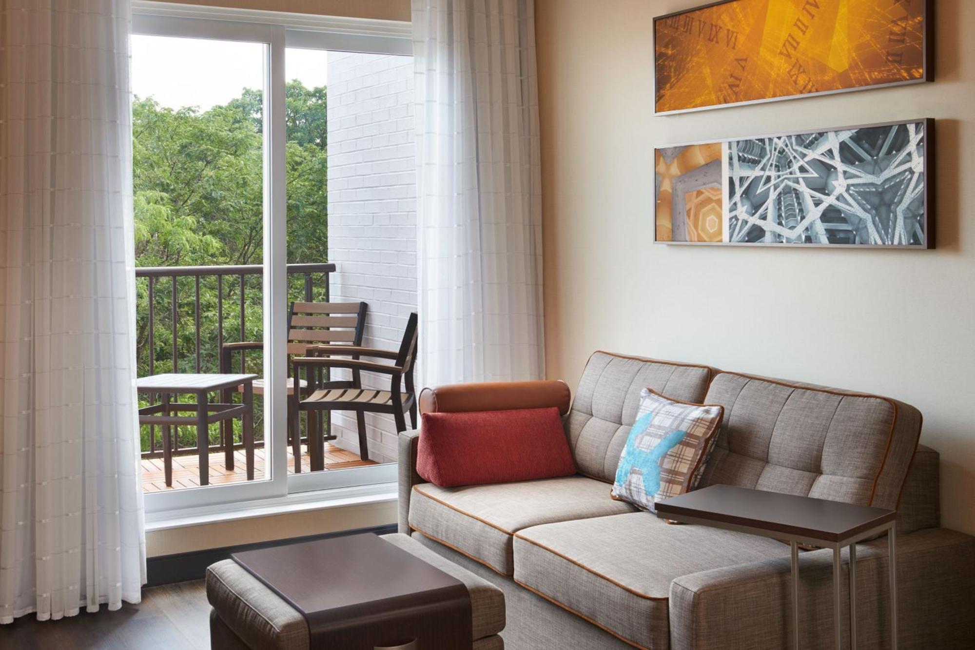 One-Bedroom Suite with Two Queen Beds, Sofa Bed and Balcony
