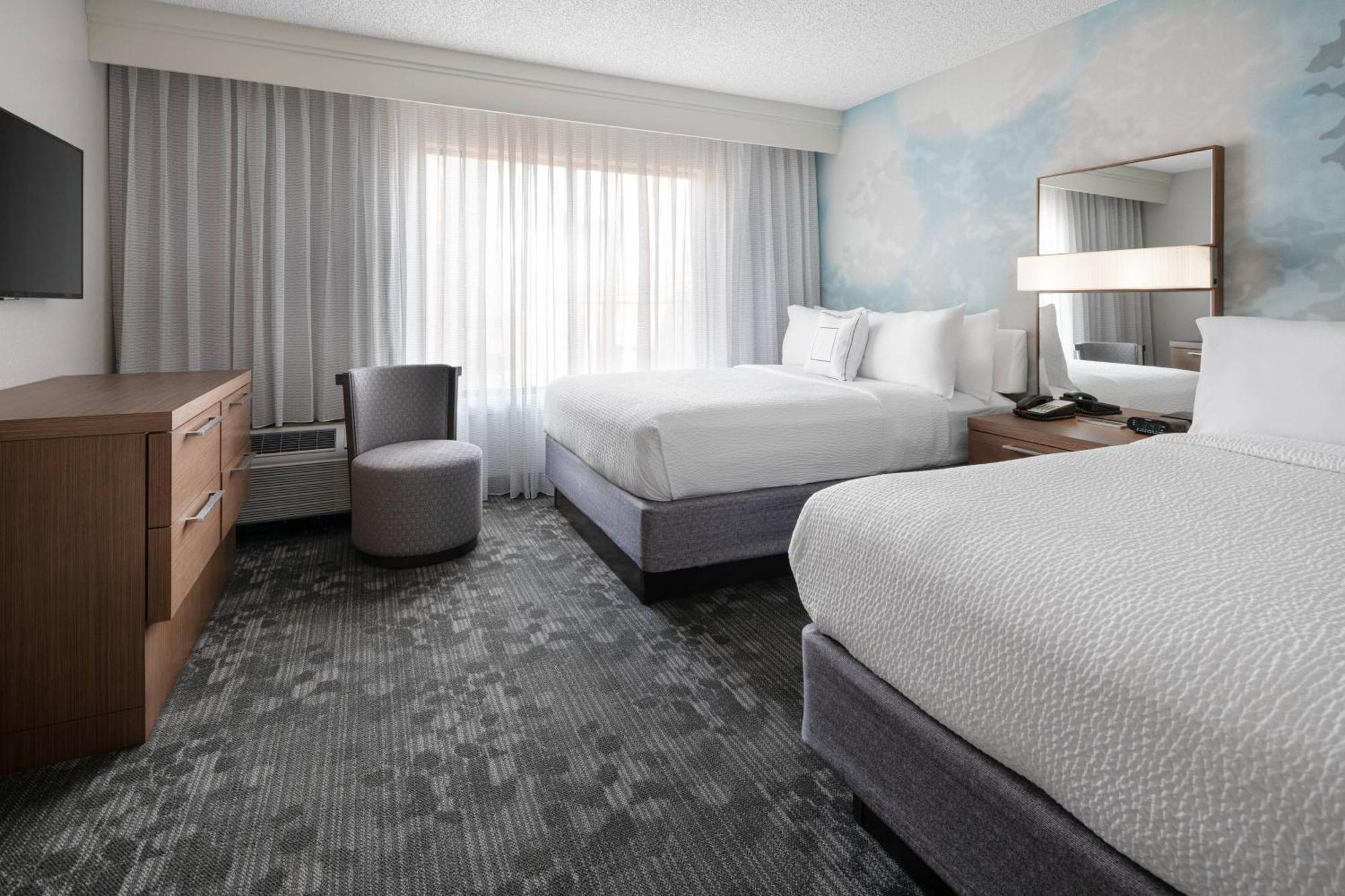 Queen Suite with Two Queen Beds and Sofa Bed