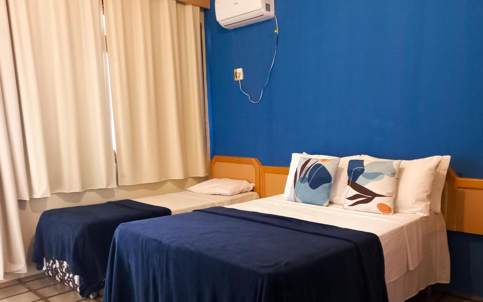Quarto Triplo com Varanda