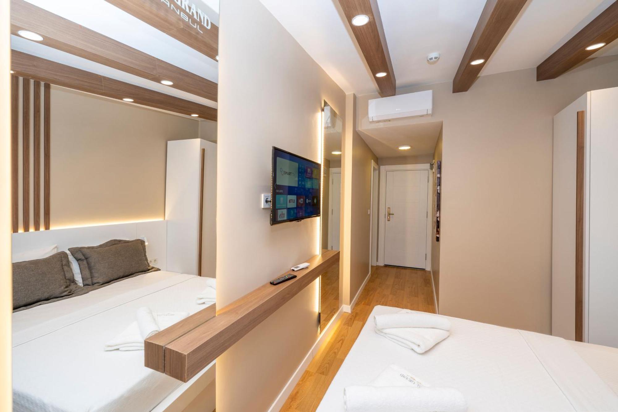 Chambre Lit Queen-Size Deluxe