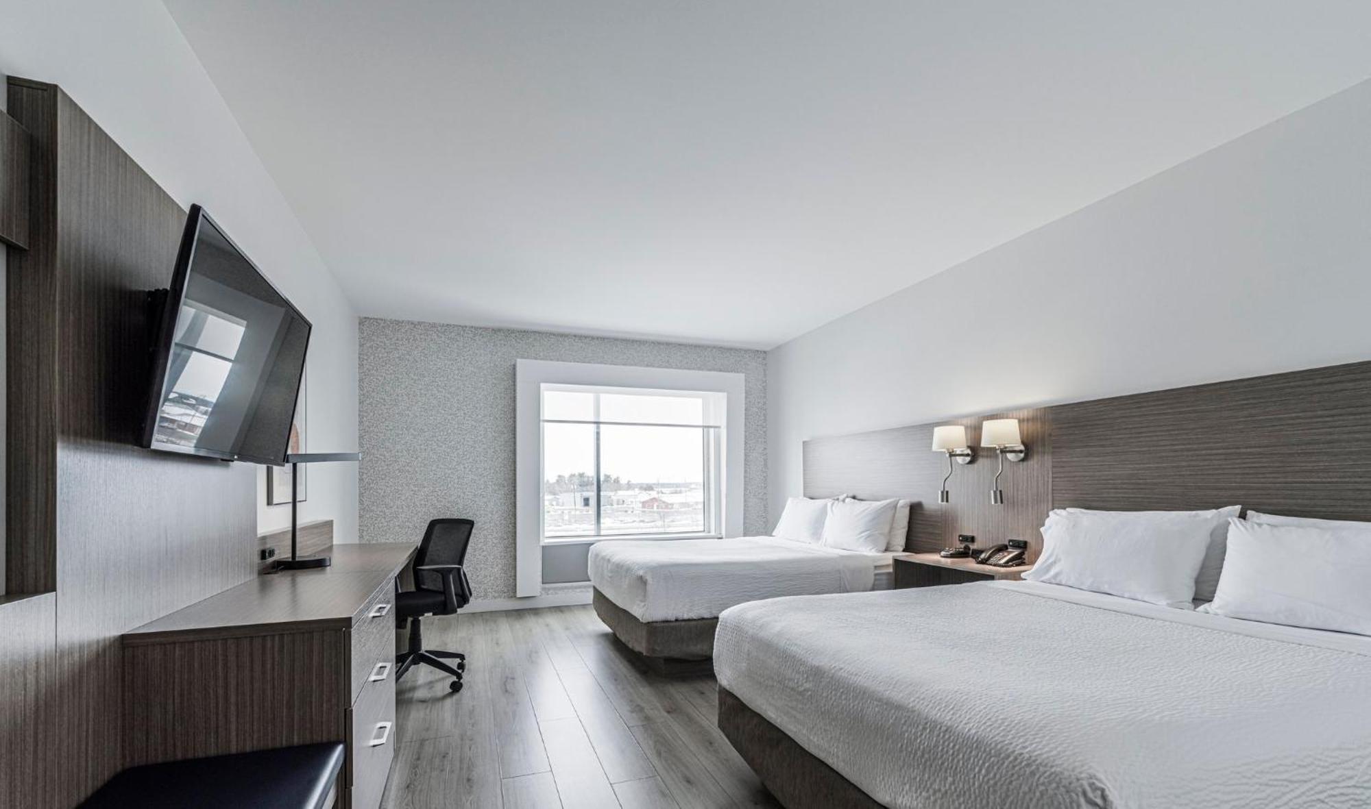 Queen Suite with Two Queen Beds and Sofa Bed