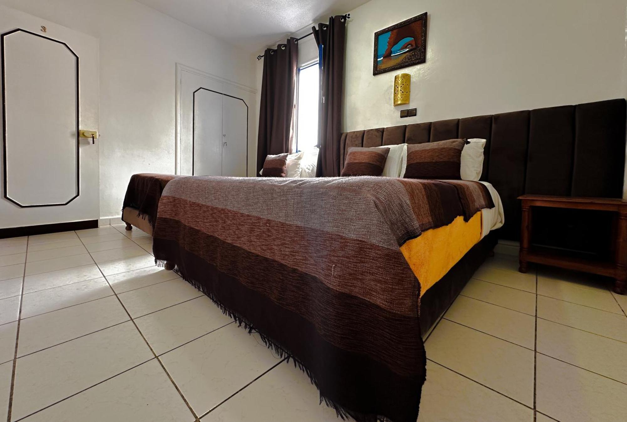 Chambre Triple avec Salle de Bains Privative