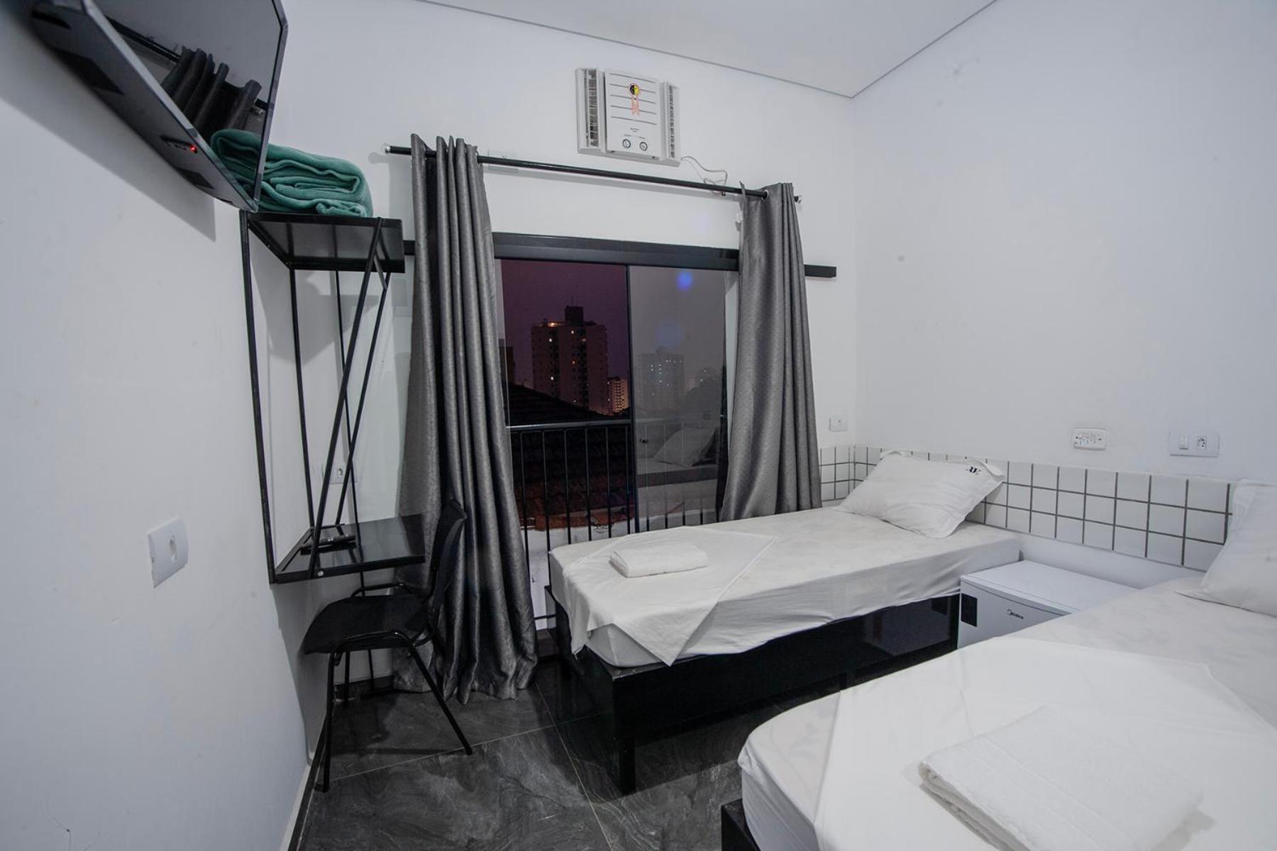Quarto Duplo