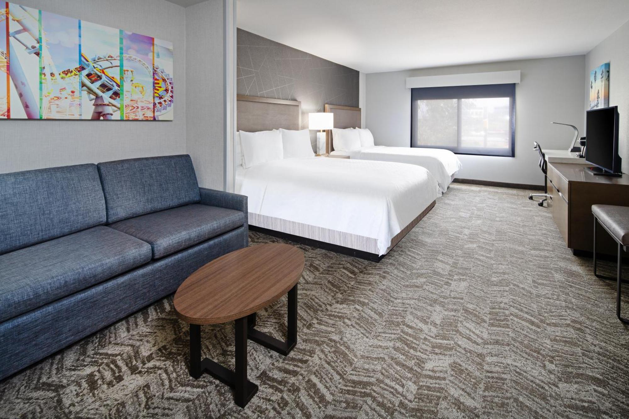 Queen Suite with Two Queen Beds with Sofa Bed