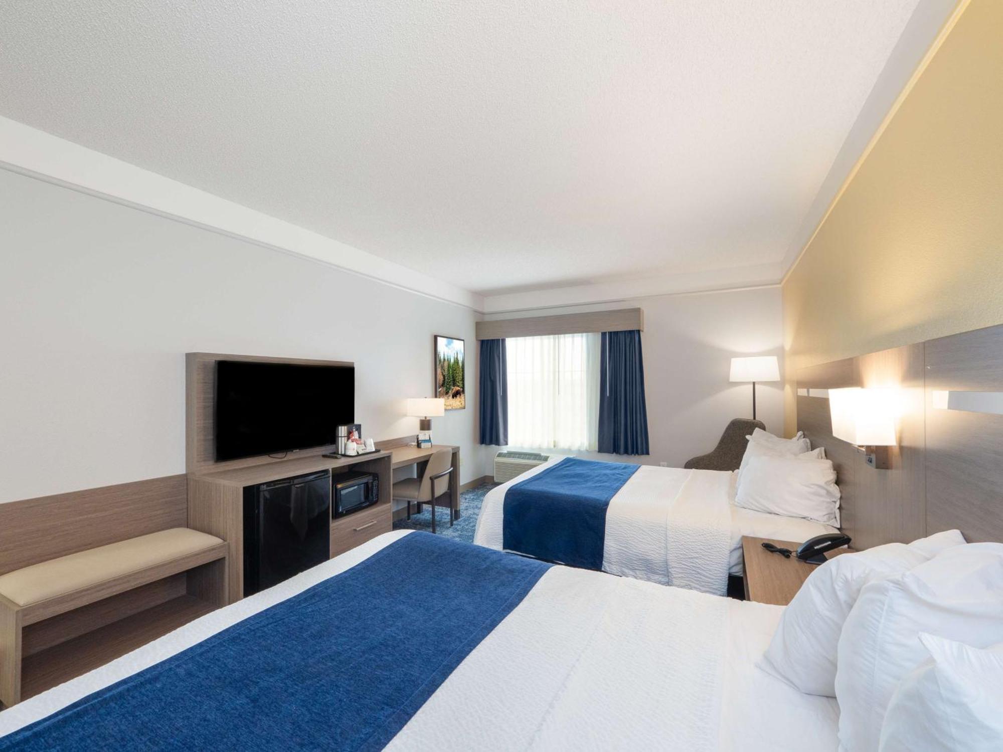 Queen Room Two Queen Beds Bath Tub Disability Access or Non-Smoking