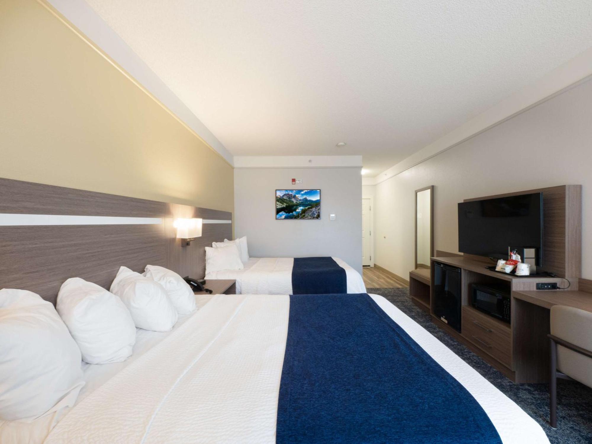 Queen Room Two Queen Beds Bath Tub Disability Access or Non-Smoking