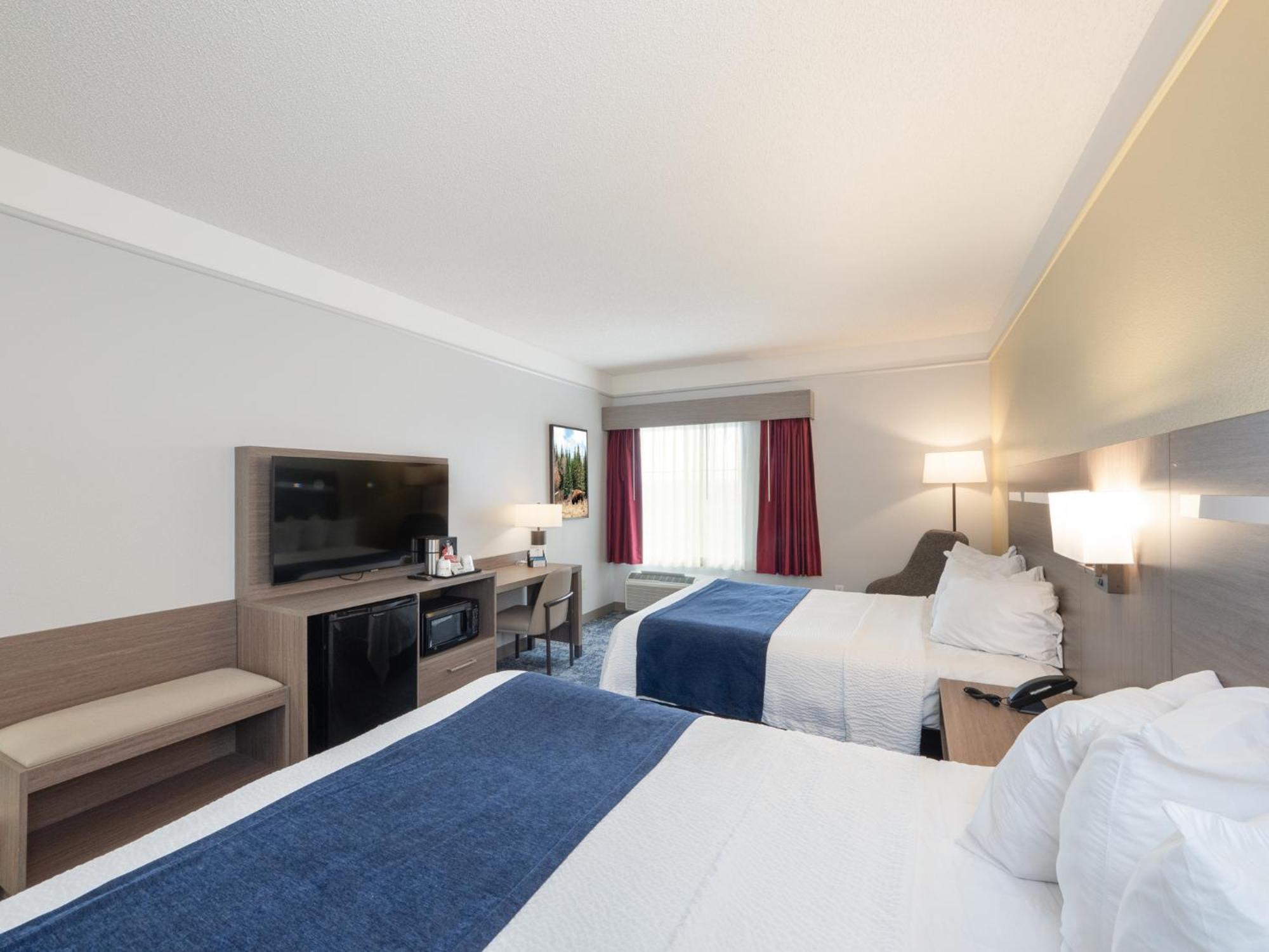 Queen Room Two Queen Beds Bath Tub Disability Access or Non-Smoking