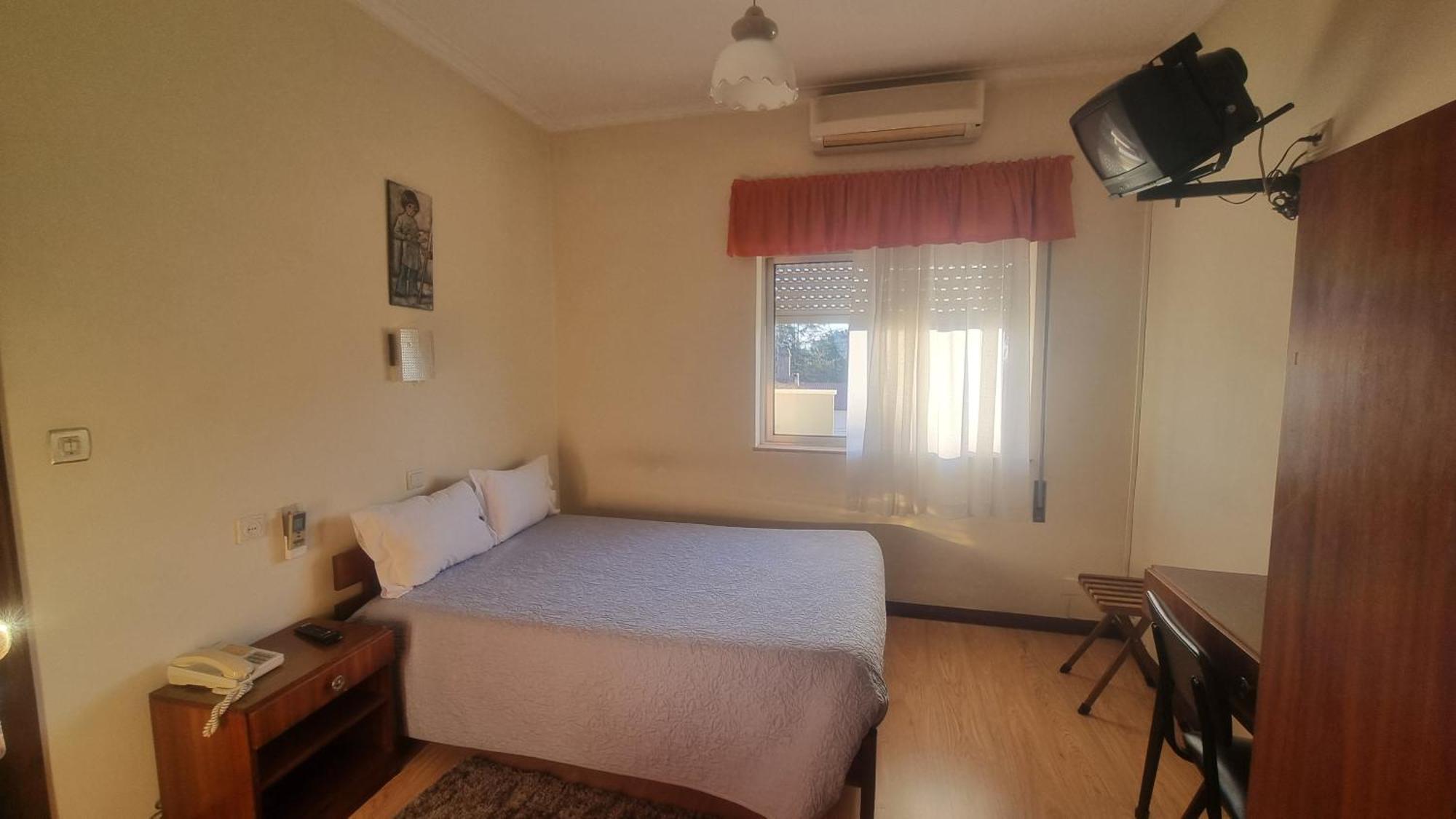 Quarto Duplo