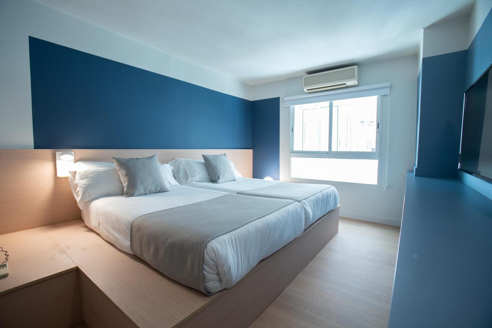 Habitación Cuádruple (2 adultos + 2 niños)
