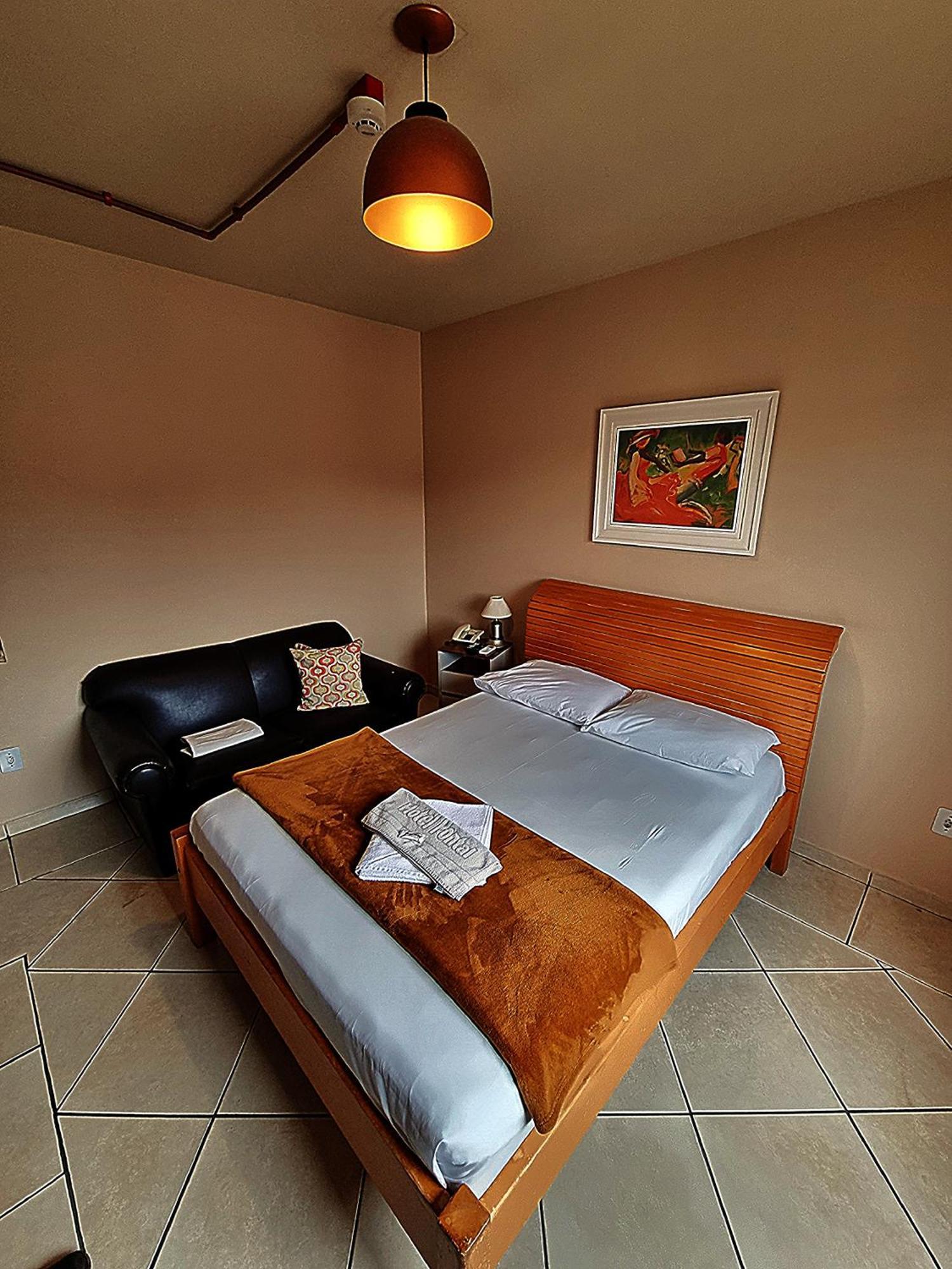 Quarto Duplo Deluxe (2 Adultos + 1 Criança)