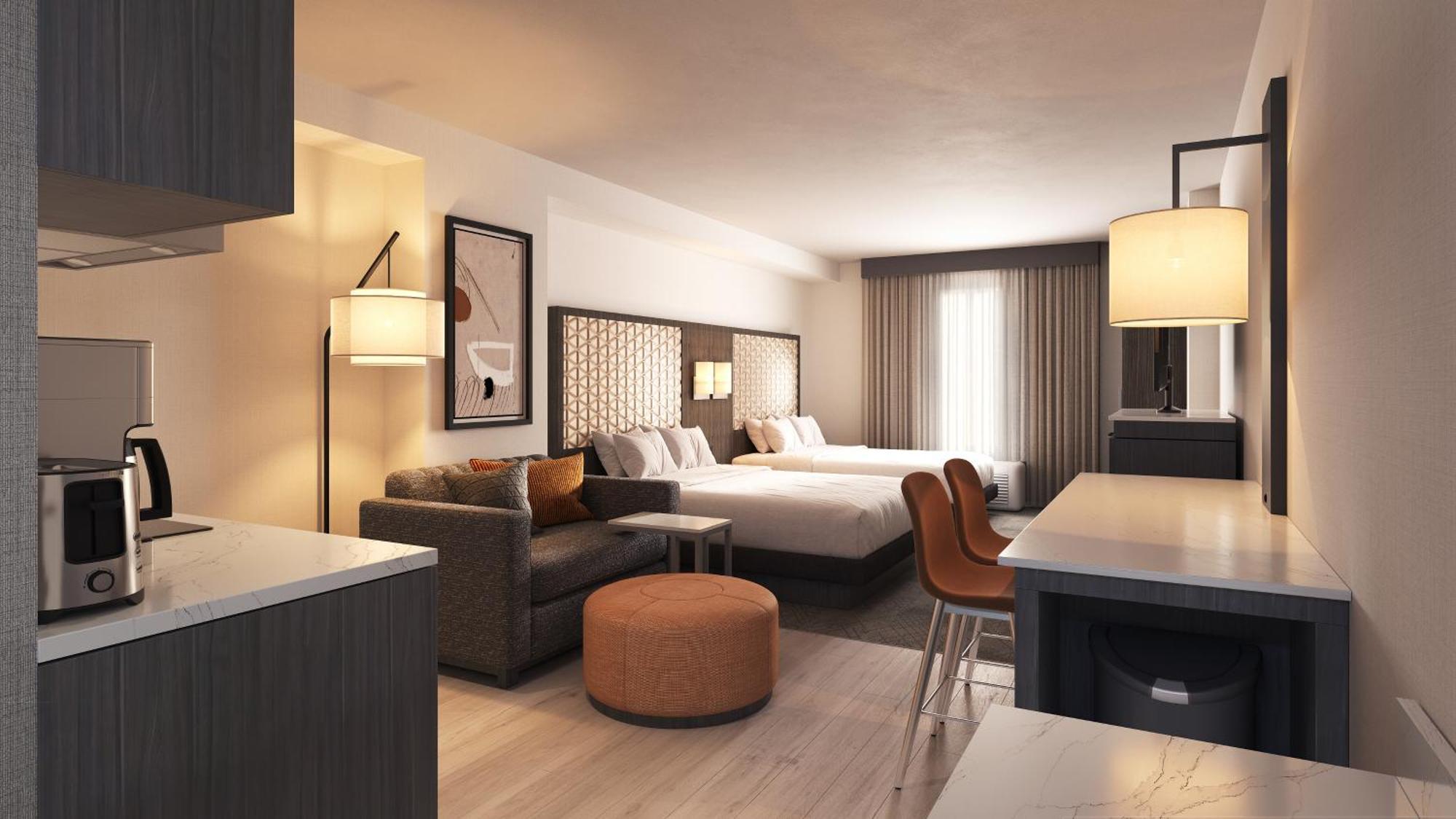 Queen Den Room with Two Queen Beds and Sofa Bed and Kitchenette