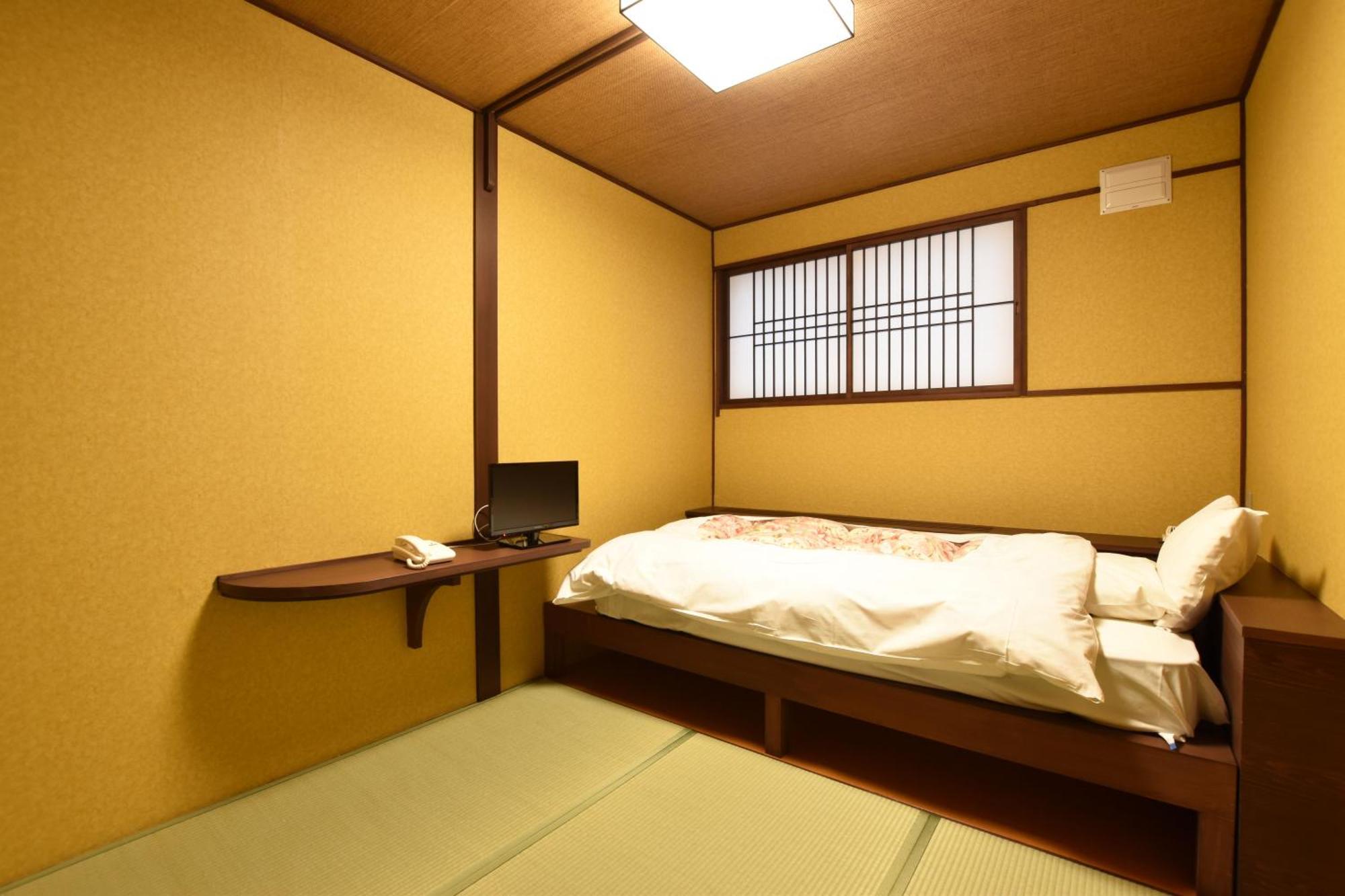 Single Room with Shared Shower and Toilet
