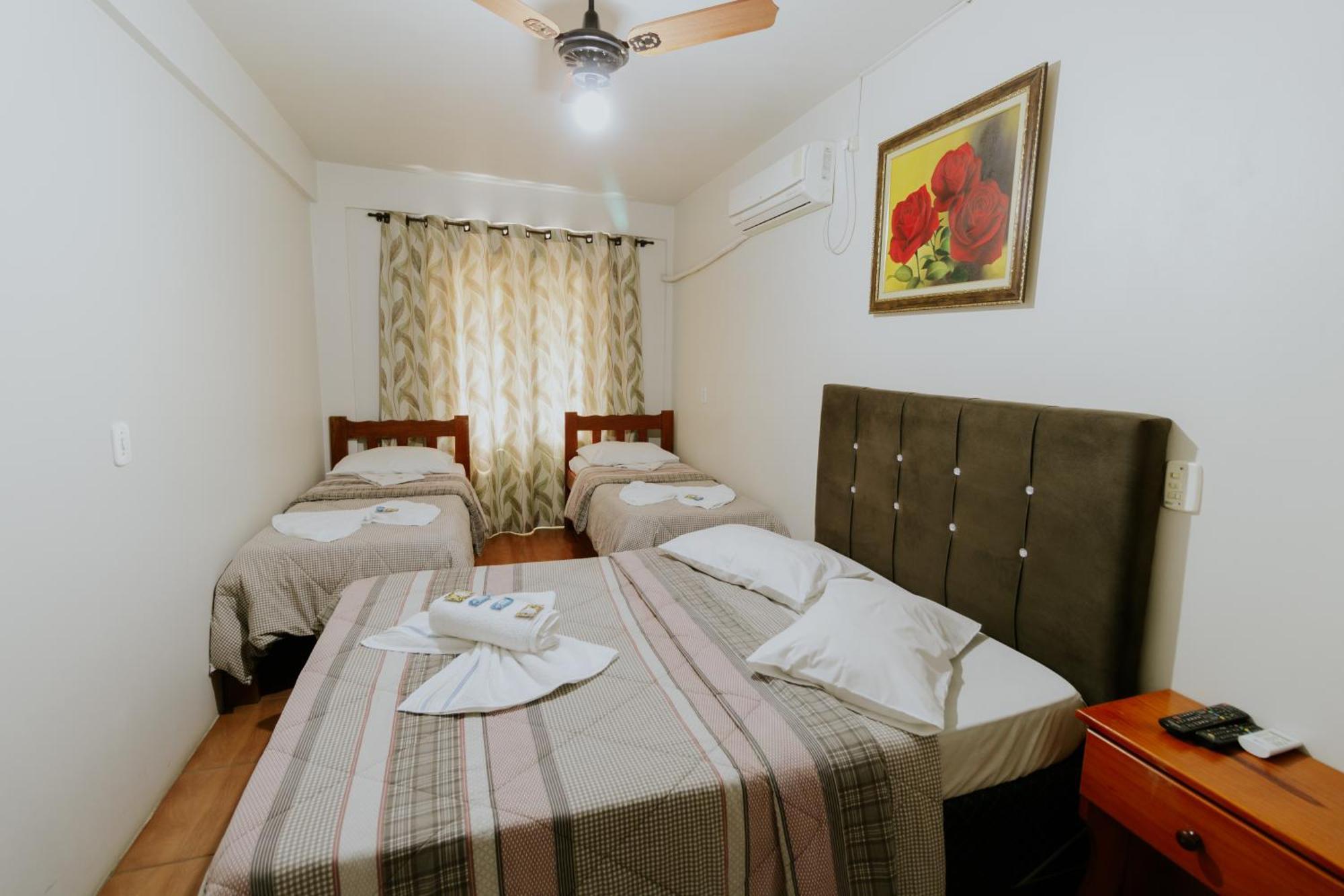 Quarto Quádruplo com Varanda
