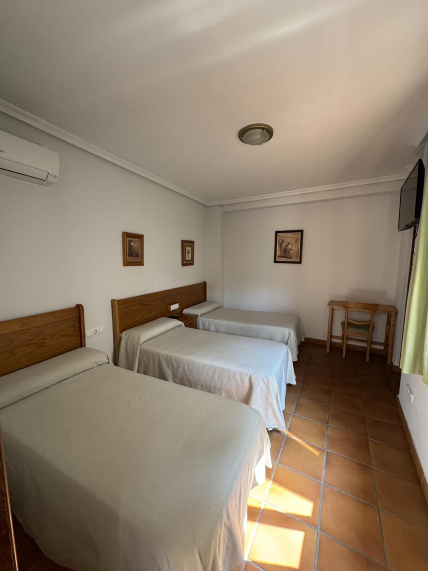 Habitación Doble con cama supletoria - 1 o 2 camas