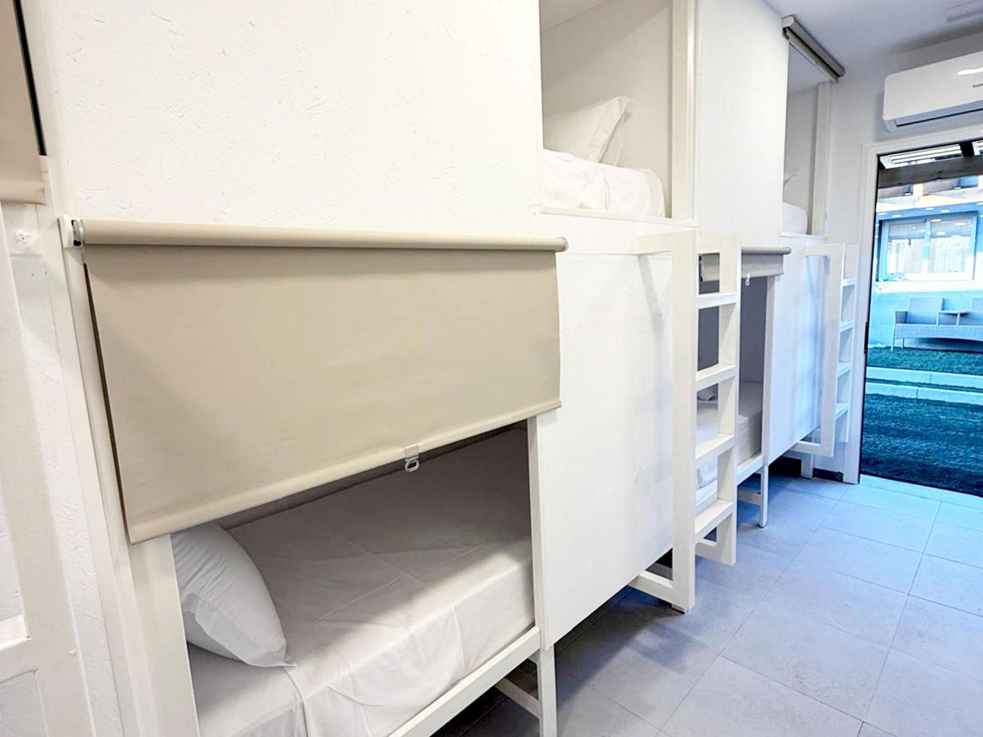 Cama individual en habitación compartida