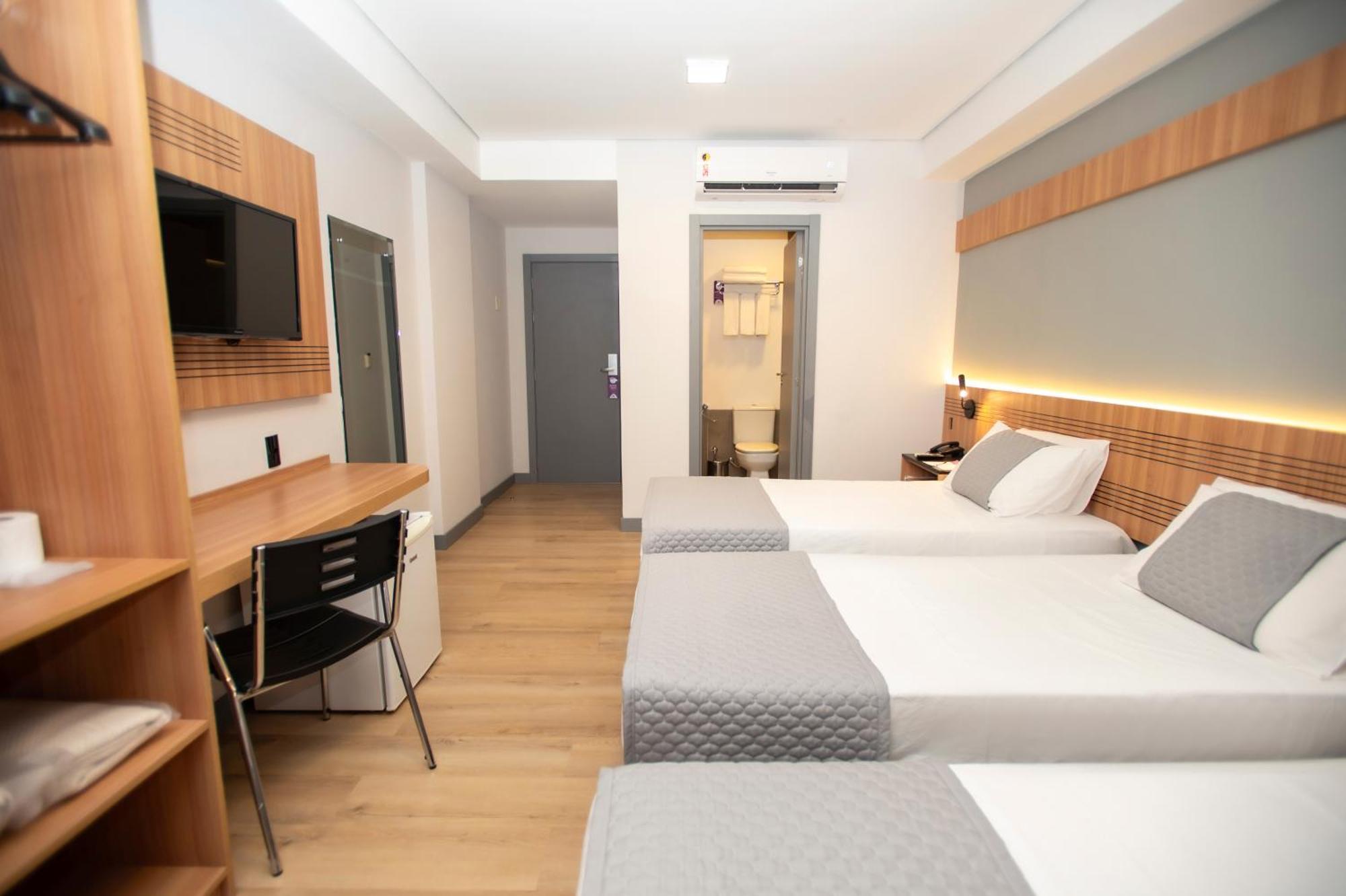 Quarto Triplo Executivo