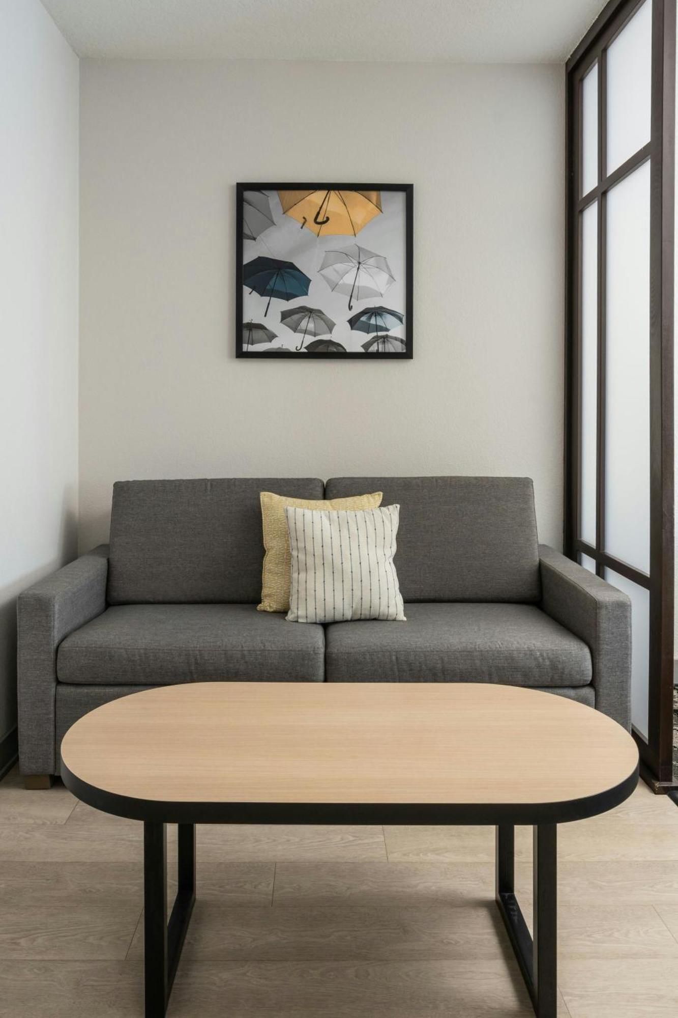 Two Queen Suite Sofa Bed City View