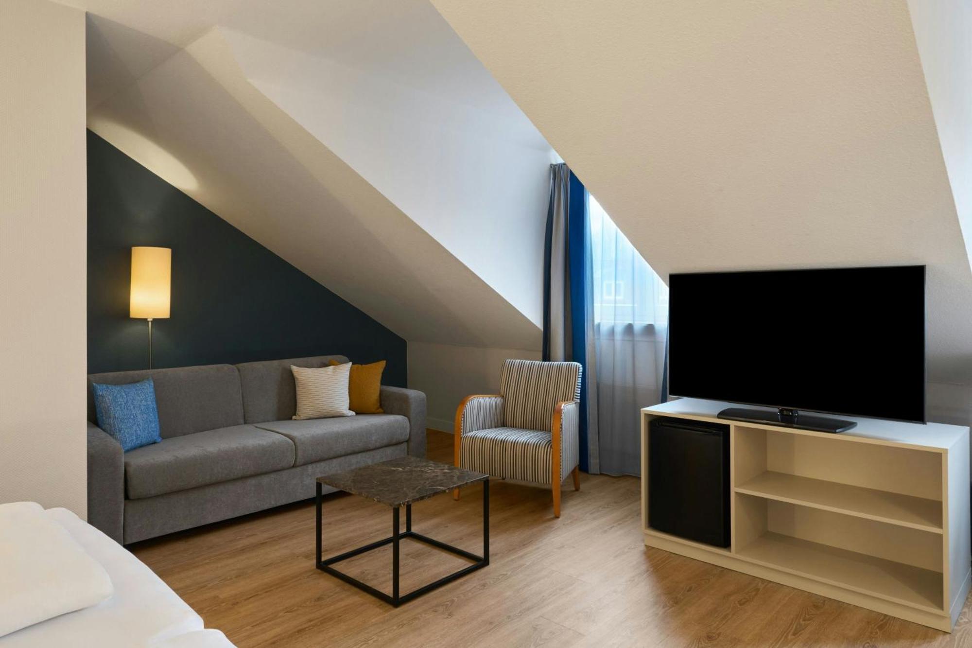 Standard Family Room Two Single Beds Sofa Bed
