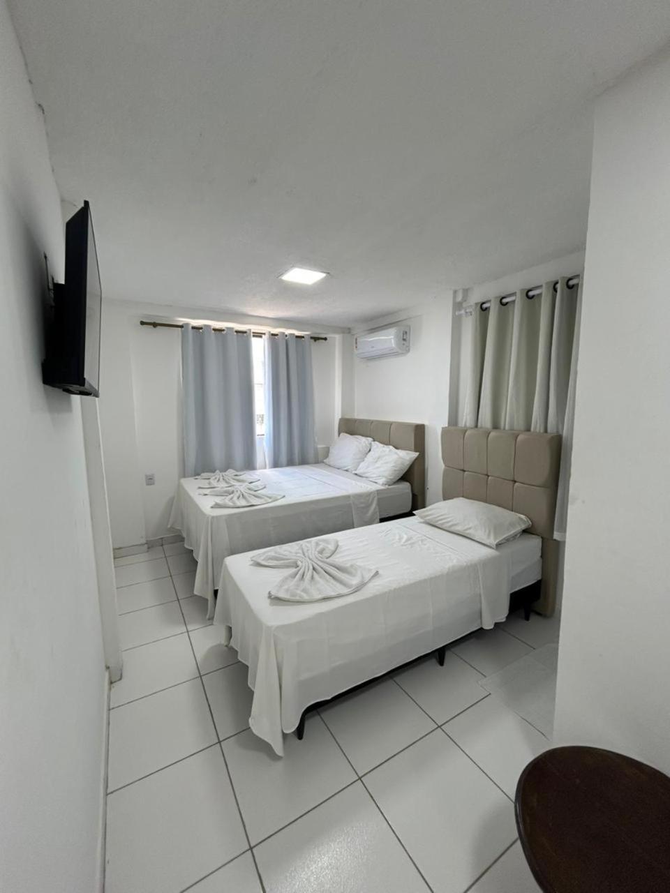 Quarto Triplo Executivo