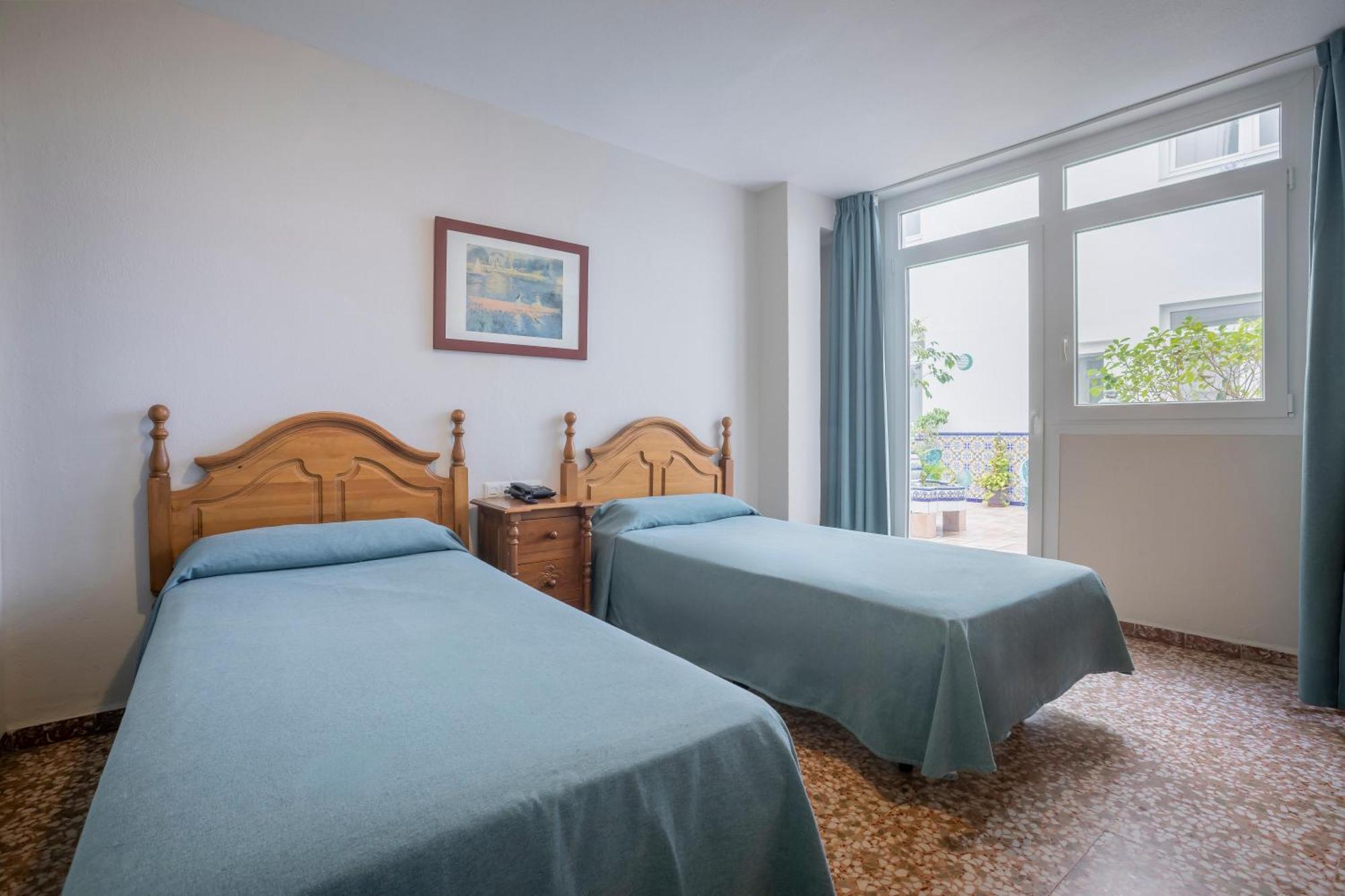 Tweepersoonskamer met 2 Aparte Bedden