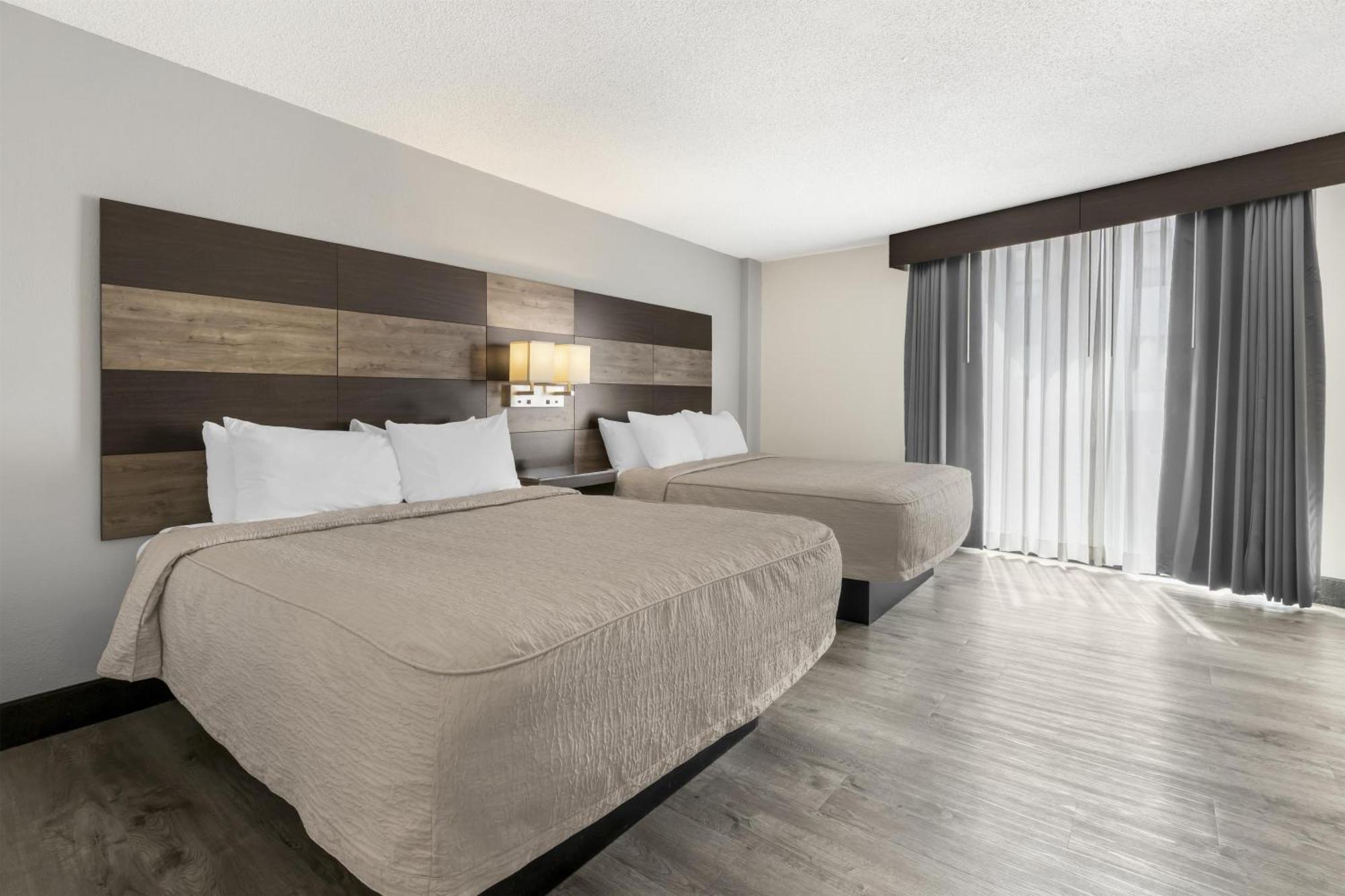 Queen Room with Two Queen Beds and Walk-In Shower - Pet Friendly/Non-Smoking
