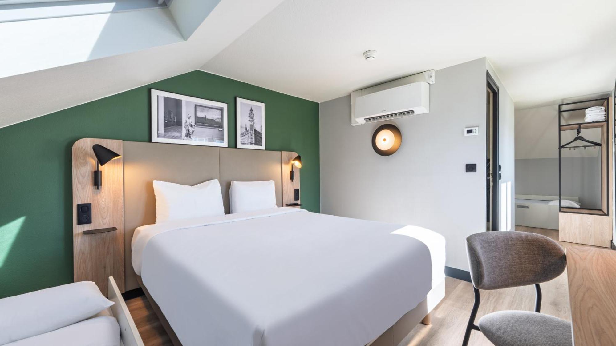 Standard Queen Room One Queen Bed Three Single Beds