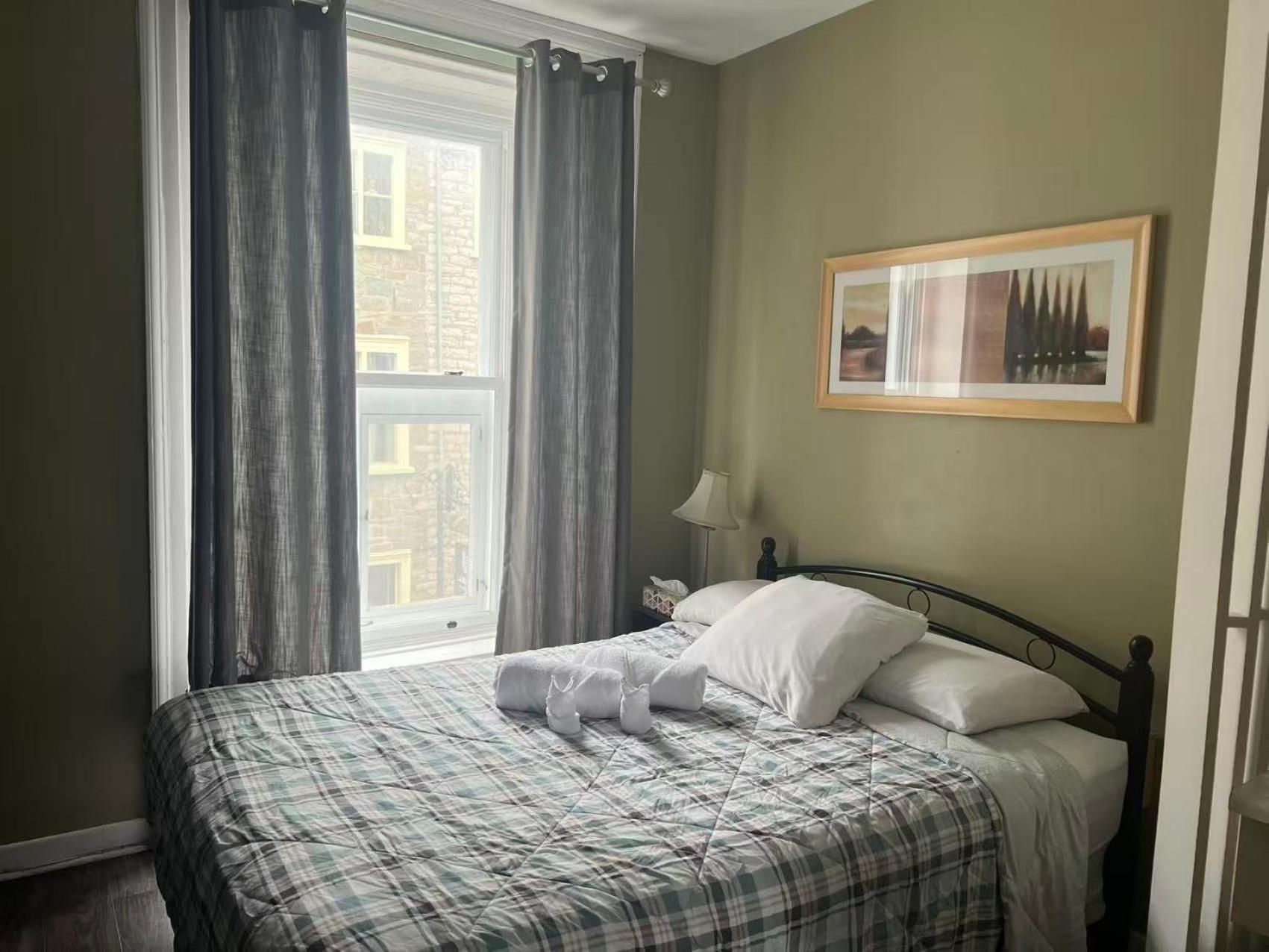Room Double Bed Shower Shared Restroom