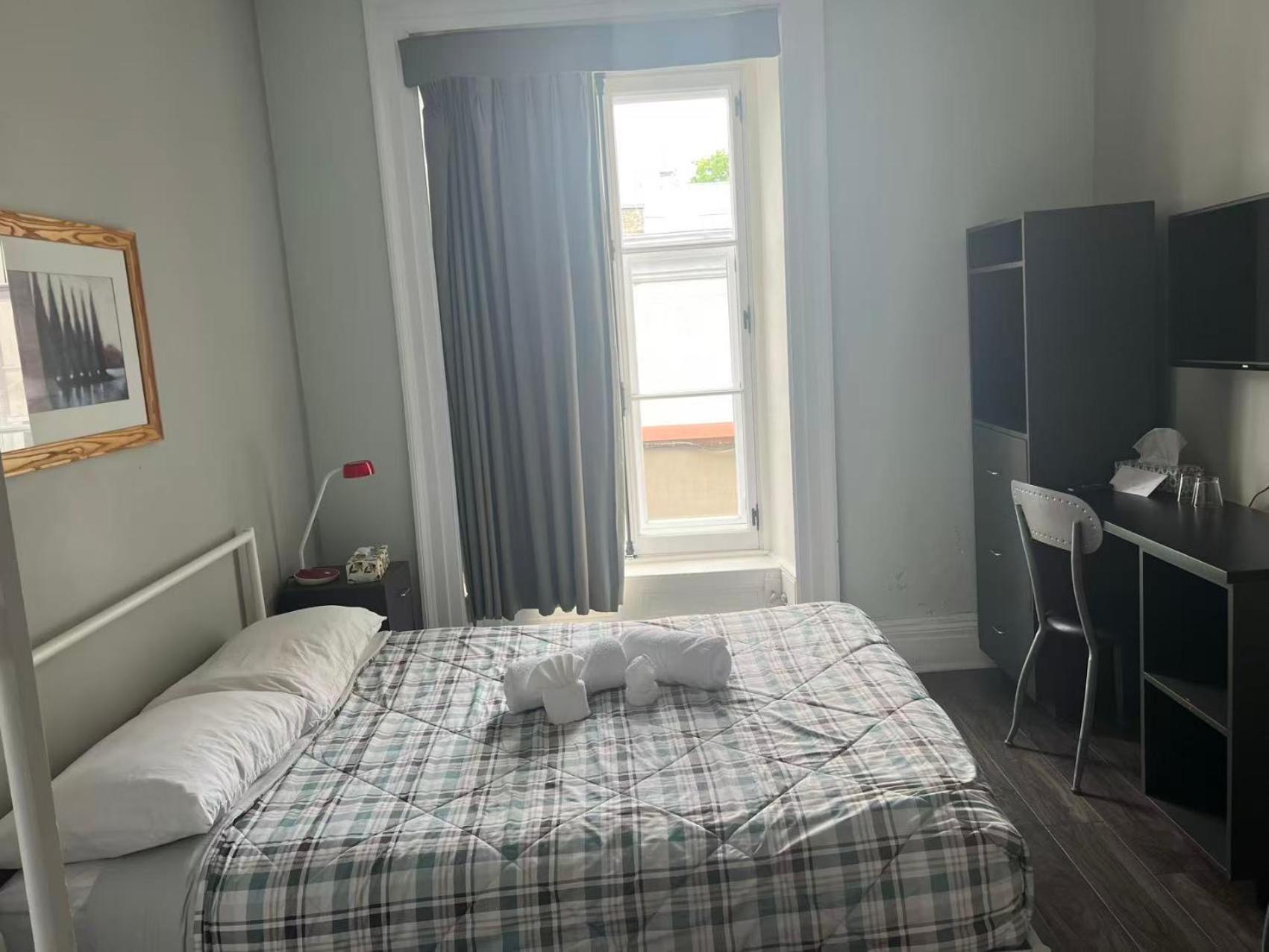 Room Double Bed Shower Shared Restroom
