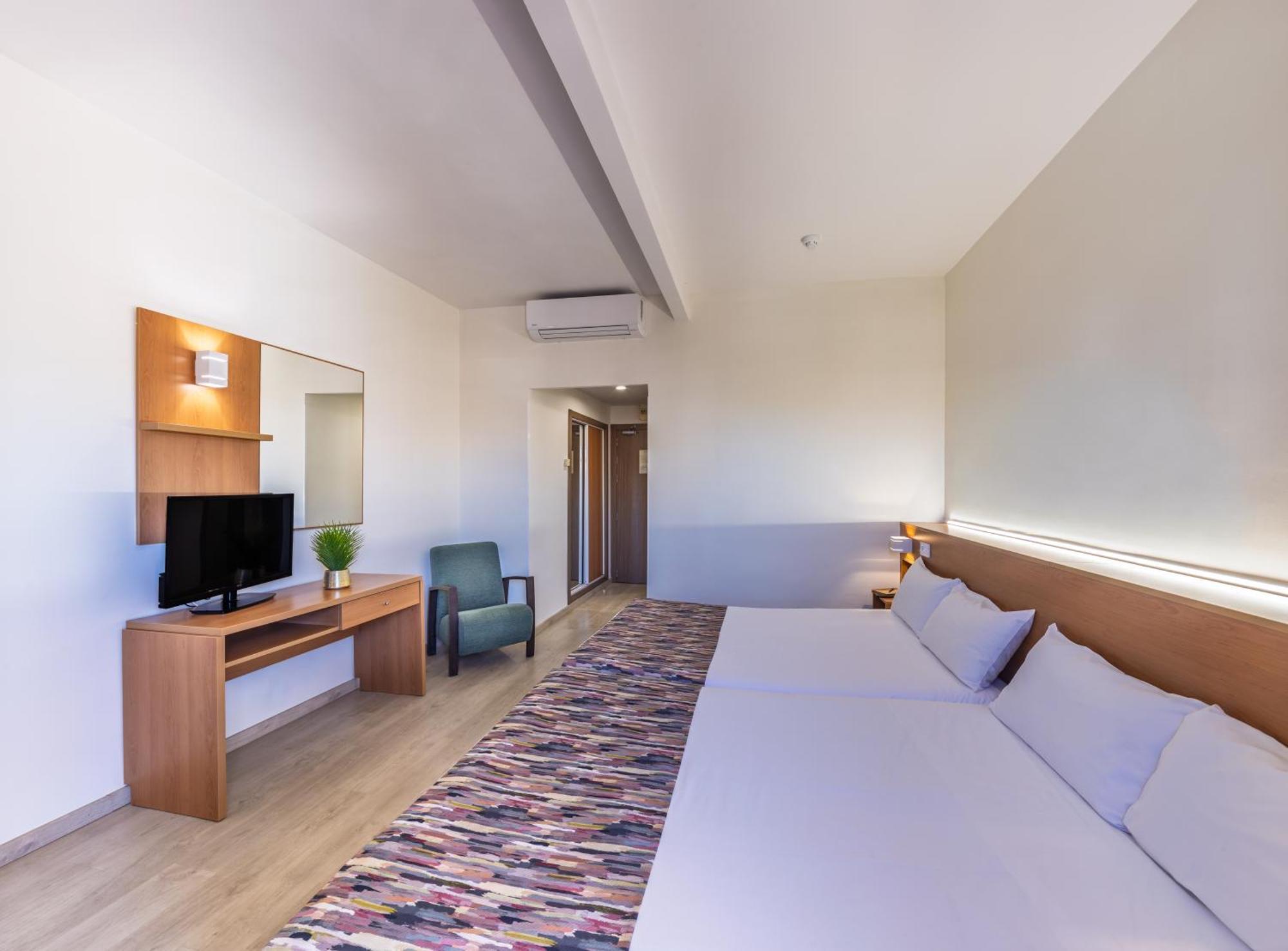 Triple Room (2 Adults + 1 Child)