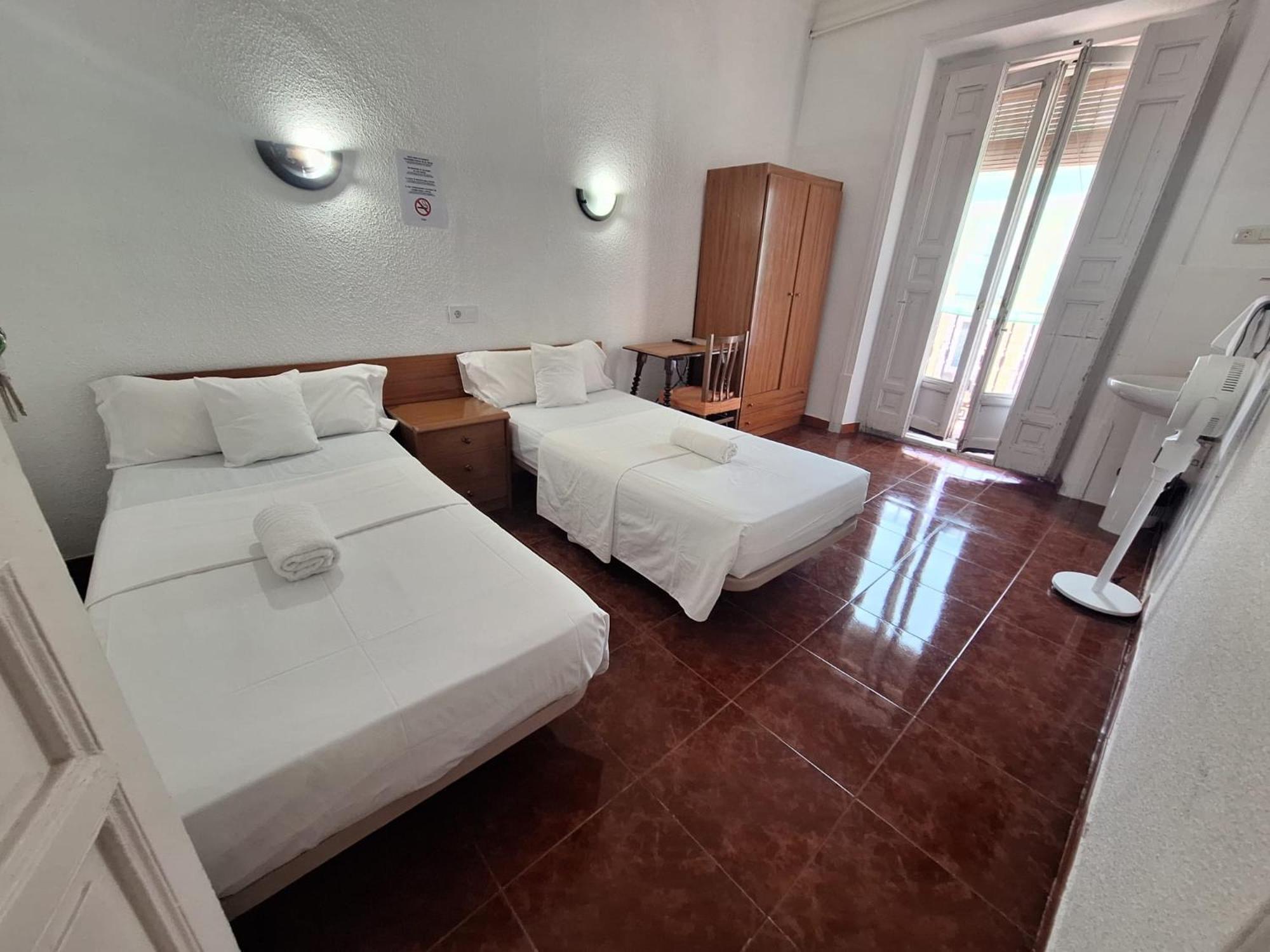 Habitación Triple con baño compartido