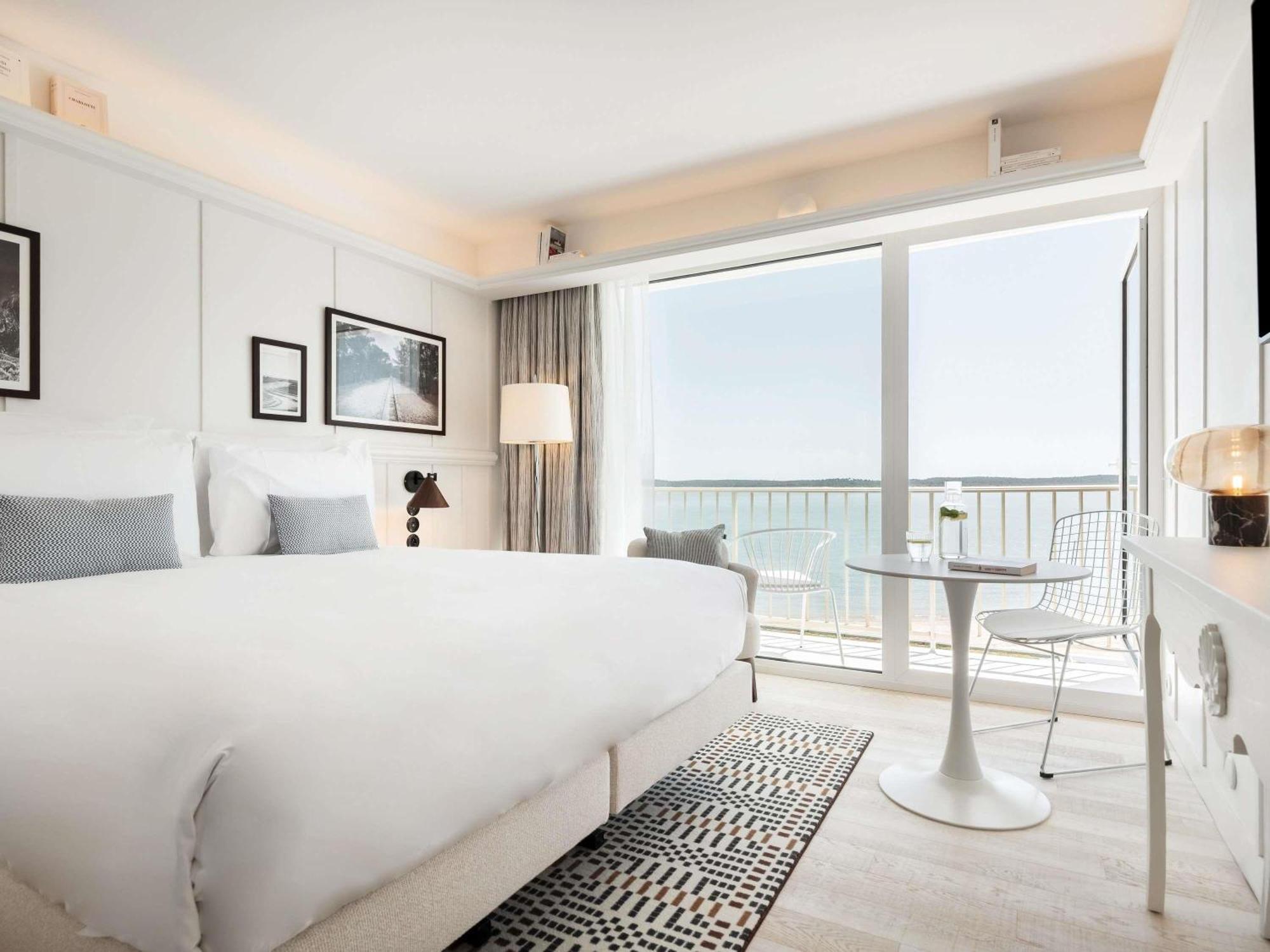 Two-Bedroom Prestige Ocean Suite with Two King Beds, One Double Sofa Bed and One Single Bed