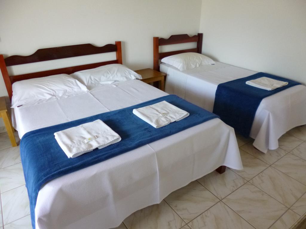 Quarto Triplo com Varanda