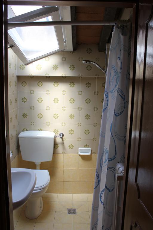 Camera Singola con Bagno in Comune