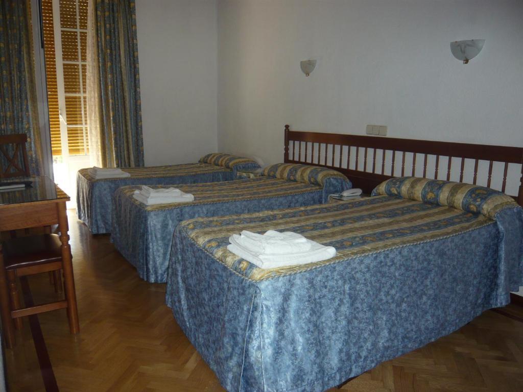 Habitación Doble con cama supletoria - 2 camas
