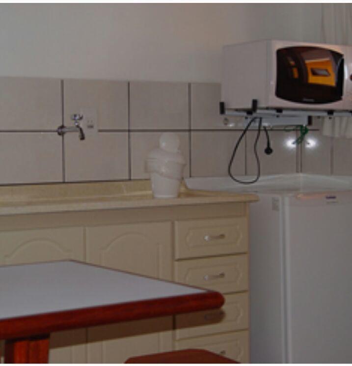 Quarto Triplo com Vista para a Piscina