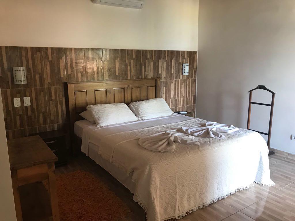 Suíte com Vista para a Piscina