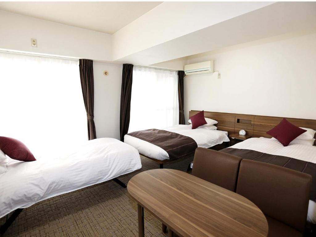 Deluxe Triple Room - Non-Smoking - House Keeping is Optional with Additional Cost