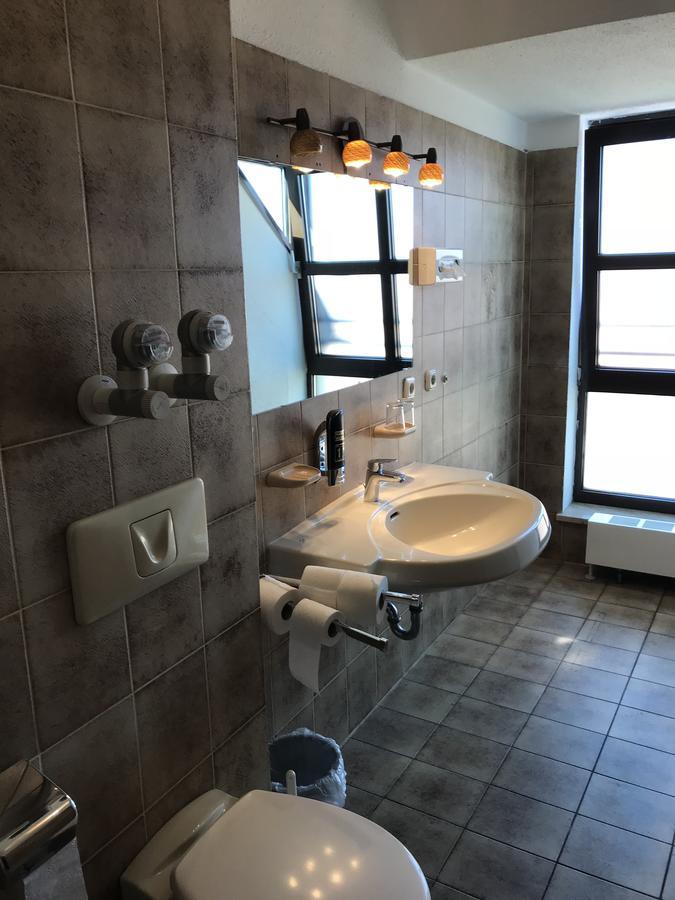 Single Room Shared Shower Toilet