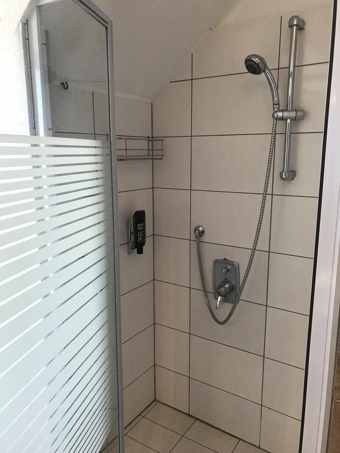 Single Room Shared Shower Toilet
