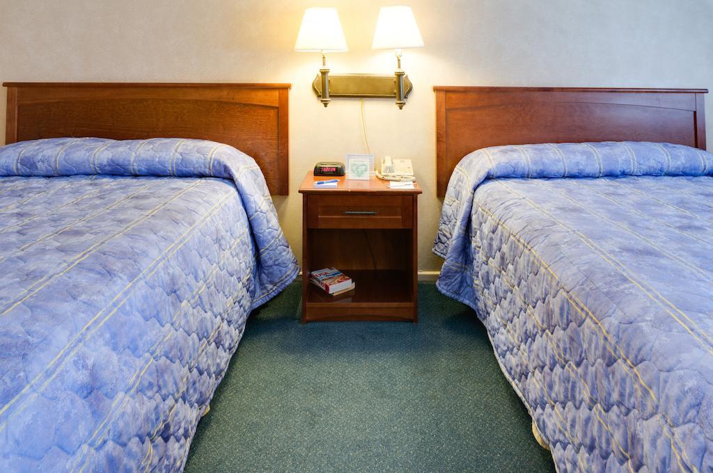 Double Room with Two Double Beds and Pool View